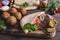 Falafel, fresh vegetables ,sauce and pita bread on wooden table