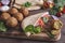 Falafel, fresh vegetables ,sauce and pita bread on wooden table