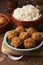 Falafel and long grain rice on a wooden table