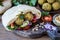 Falafel with pita and vegetable salad and hummus with pine nuts