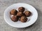 falafel plate with sesame seeds served in dish isolated on background top view of Arabic fast food