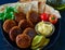 Falafel platter in blue bowl