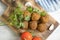 Falafel, tomatoes  gourmet   food  homemade  veggies  cooking  on a wooden background nutrition