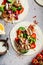 Falafel with tortilla, vegetables and tahini dressing, top view