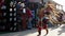 FALCON HEIGHTS, MN - 22 AUG 2019: Cultural dance performers in costume walk past on their way to perform at the State Fair