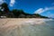 Fale`s on a white sand beach at Lalomanu, Samoa