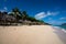 Fale`s on a white sand beach at Lalomanu, Samoa