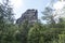 The Falkenstein mountain in Saxon Switzerland behind trees