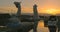 FALKIRK, SCOTLAND, DECEMBER 28, 2016: Dawn breaks and the sun rises over The Kelpies, part of The Helix