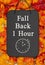 Fall Back 1 hour time change message on a chalkboard sign on pumpkins