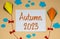 Fall Background With Kite, Clouds and Autumn Decoration and Text Autumn 2023