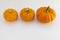 Fall background maple leaves with orange pumpkins white background with copy space, autumn