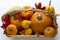 Fall basket overflowing with pumpkins, gourds & fall leaves