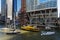 Fall Bridge Lift and Boat Run with a Yellow Water Taxi and Sailboats in Downtown Chicago