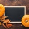 Fall chalkboard background with pumpkins, red and yellow leaves