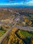 Fall in the City. Aerial View of a colorful autumn foliage surrounding a complex traffic interchange