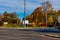 Fall in the city; Fall foliage colors at the entrance to a cemetery. .