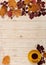 Fall concept. Cups of coffee and autumn leaves on a light wooden