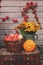 Fall at country house. Seasonal decorations with pumpkins, fresh apples and flowers. Autumn harvest