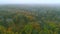 Fall countryside aerial view misty forest skyline