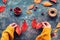 Fall DIY decorations from natural materials. Making garland with hemp cord and vibrant red Autumn leaves