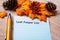 Fall Foliage Leaf Peeper concept on notebook and wooden board