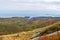 Fall foliage meets Somes Sound and the ocean in Acadia National Park