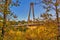 Fall Foliage Surrounding A Bridge