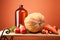 Fall harvest - yellow squash, tomatoes, carrots, onions and herbs on a wooden shelf