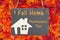 Fall Home Maintenance Tips with a chalkboard with a wood house