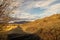 Fall in Iceland. Landscape view with grass field in Iceland. Autumn landscape cloudy day. Climate changes. Nature and