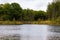 Fall landscape forest bridge and lake Fall colors in a park Michigan