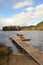 Fall landscape with Indian canoe at dock