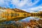 Fall Mountain Reflection with blue skies, British Columbia, Canada