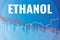 The fall price on Ethanol in financial market. Text Ethanol on blue and red finance background
