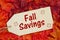 Fall Savings message on a wood gift tag