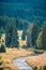 Fall scenery of a river winding through meadows in the Modrava valley, Sumava, Czechia