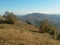 Fall season at the mountain with colorfully trees, meadows and hills