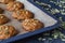 Fall snickerdoodle cookies with pumpkin and cinnamon overhead shot