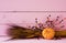 Fall Still Life with Mini Pumpkin, berries and wheat on Bright Pink Shiplap Boards with room or space above for copy, text or