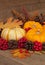 Fall Still Life with Pumpkins, Berries, and Gourd