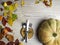 Fall Themed Table Setting Arrangement for a Seasonal Party, color leaf, pumpkin, red berries, physalis, apple