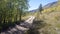 Fall view of four wheel drive road [Medano Pass primitive road] through the Sangre De Cristo range of the Rocky Mountains in