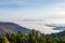 Fall weather inversion in mountains - above the clouds