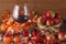 Fall wine in glass on rustic wooden background