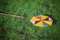 Fallen colourful kite on grass