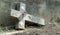 Fallen cross gravestone in Romanian cemetery