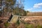 Fallen hunting pulpit on the edge of a forest and clearing