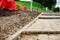 Fallen paving stones on the sidewalk in the park