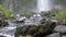 Fallen rocks and rapids at the base of Latourell falls